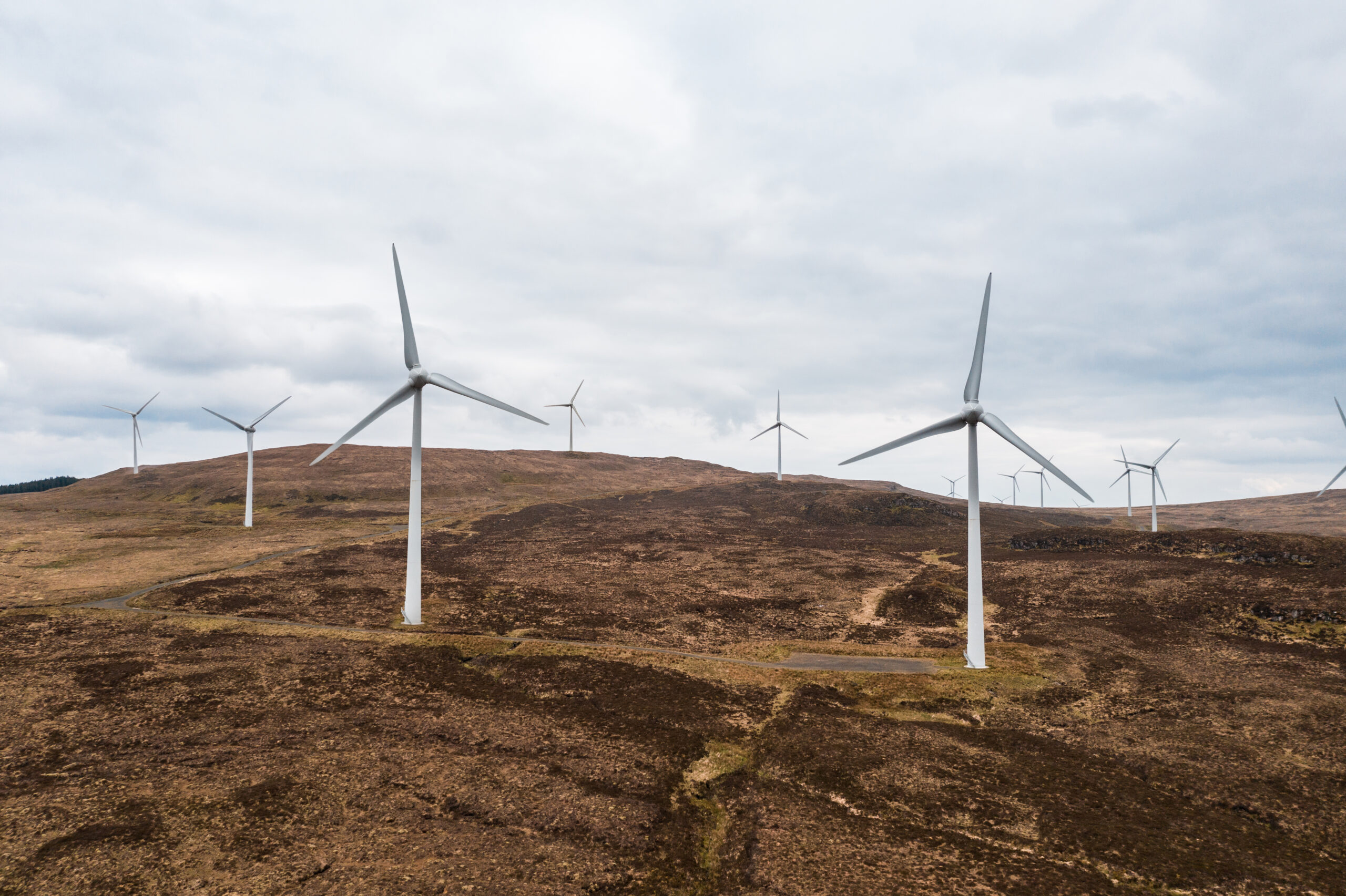 wind turbine for power generation on a barren land 2025 01 07 12 12 22 utc scaled