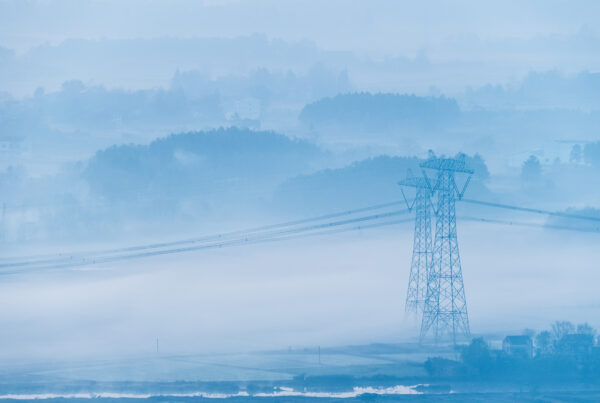 power transmission towers in morning fog 2025 01 29 07 38 07 utc